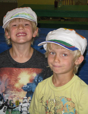 Boys wearing their hand-painted hats.