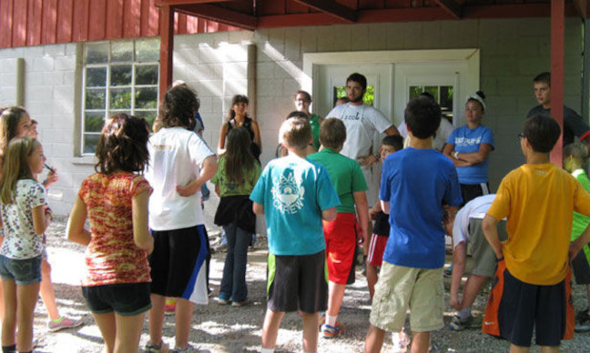 Singing Grace before a Meal at Camp Carew.