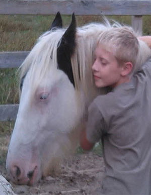 A boy and a horse.
